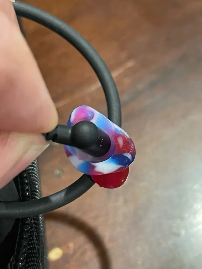 A colorful custom Clarity Aloft adapter with the black tube tip